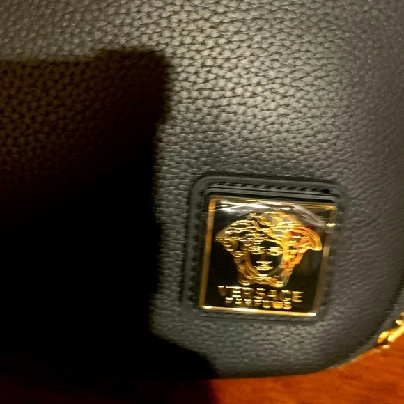 Brand new authentic cosmetic Versace case with 2 zipper compartments with handle